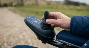 Detailed view of the user-friendly joystick controller and speed settings on an affordable electric wheelchair.