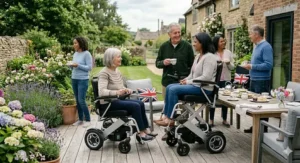 A garden party setting where a woman uses the elevating seat function of her electric wheelchair to rise to eye level, comfortably conversing with standing guests.