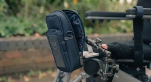 A secure-grip phone bag attachment specifically designed for wheelchair users.