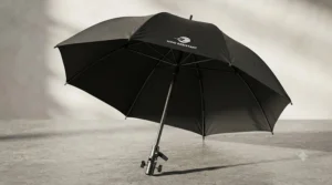 A black heavy-duty waterproof wheelchair umbrella designed to withstand strong gusts of wind.