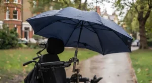 Illustration showing a windproof hands-free wheelchair umbrella with flexible ribs withstanding strong gusts.